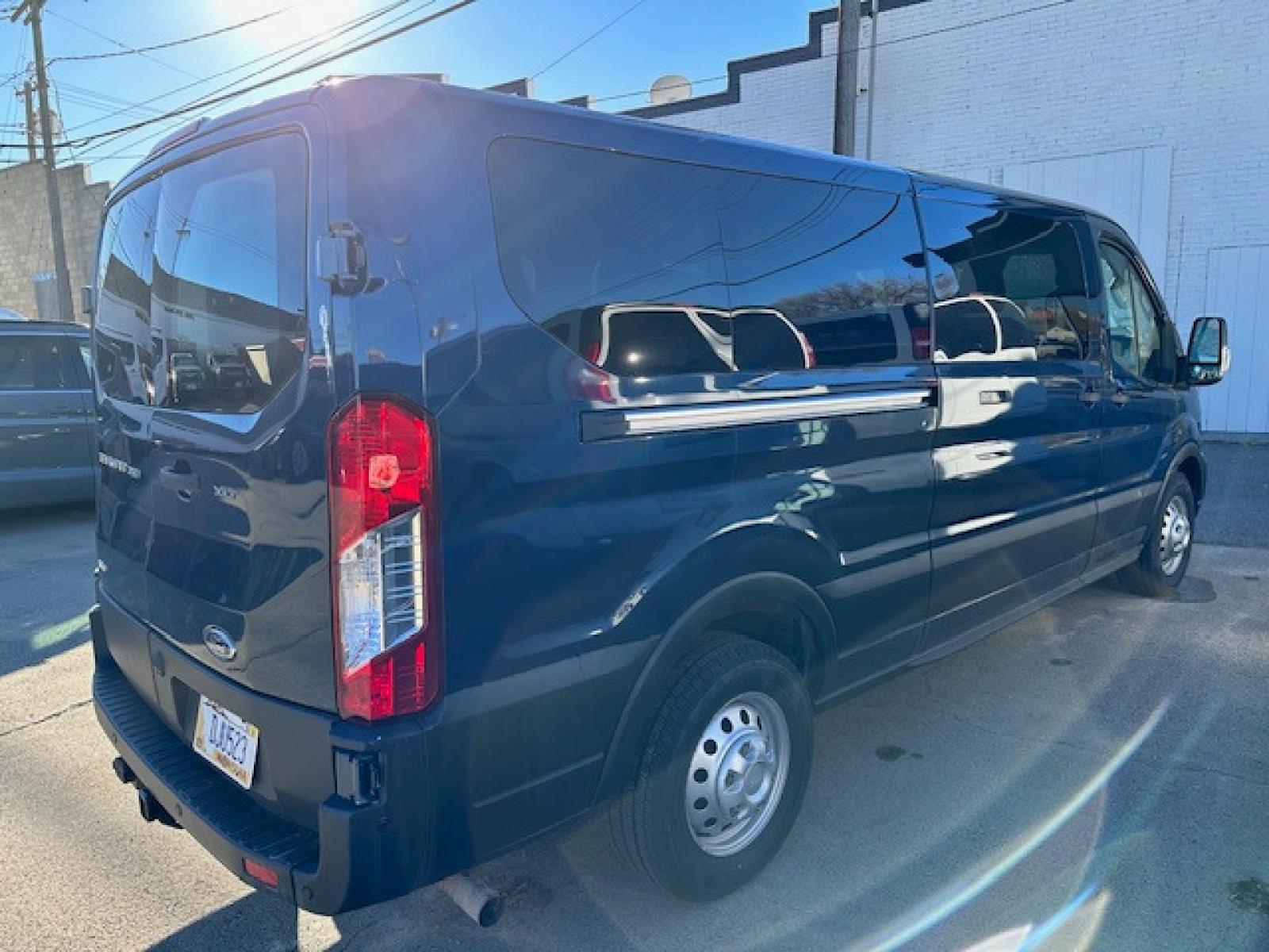 2022 BLUE /Charcoal Gray Ford Transit (1FBAX9Y8XNK) with an 3.5 engine, Automatic transmission, located at 3200 1st Avenue North, Billings, MT, 59101, (406) 245-9055, 45.779270, -108.510742 - This is One of Our 15 Passenger Vans Available for Sale or Rent. Dual Power Seats, Tilt Steering, Cruise Control, Front & Rear Air Conditioning, Power Windows, Power Door Locks, Privacy Glass, Extended Fuel Capacity, Tow Package, All Wheel Drive and Much More! CarFax Dealer Auto Brokers of Monta - Photo #2